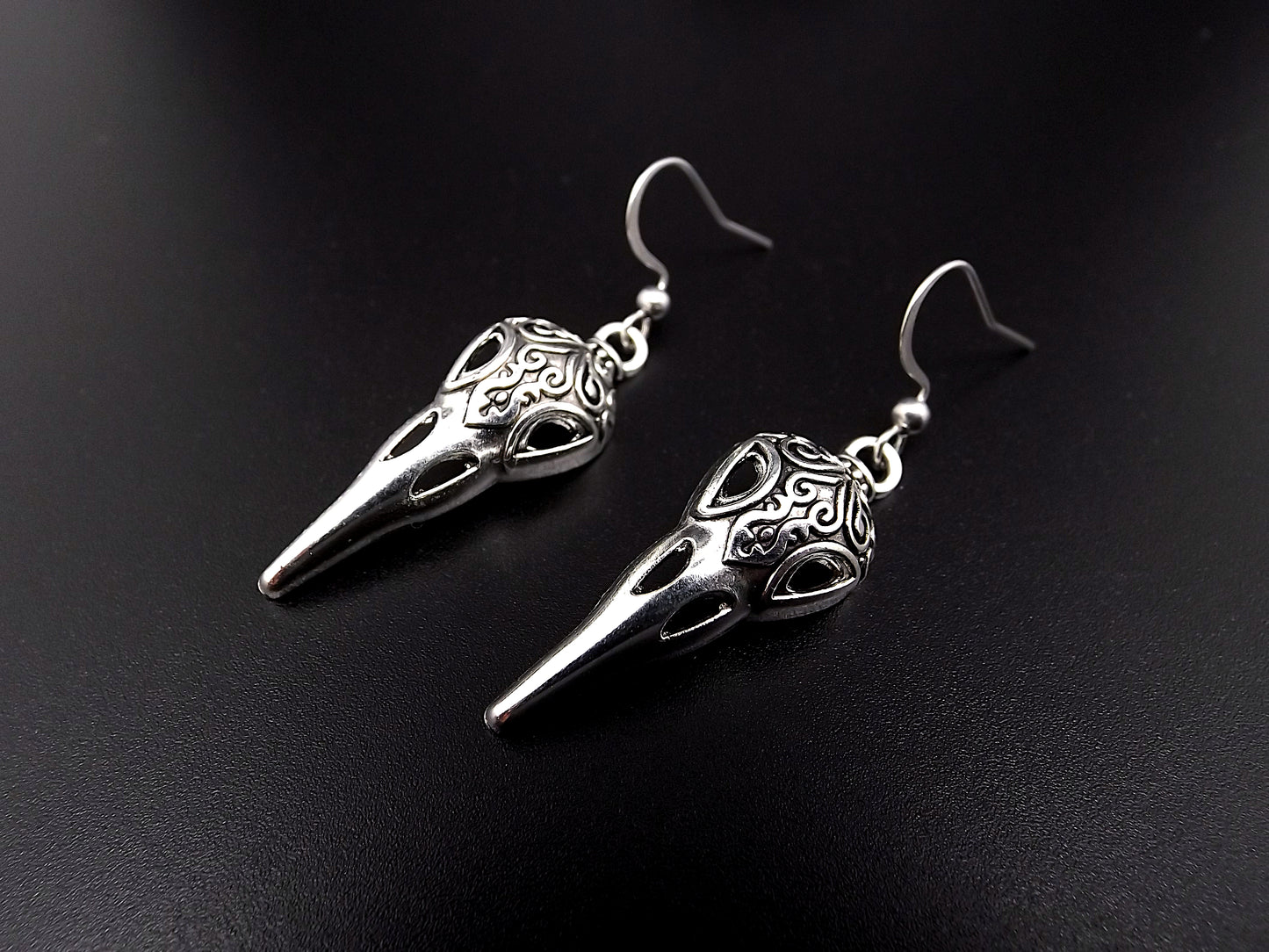 Boucles d'oreilles viking crane de corbeaux.