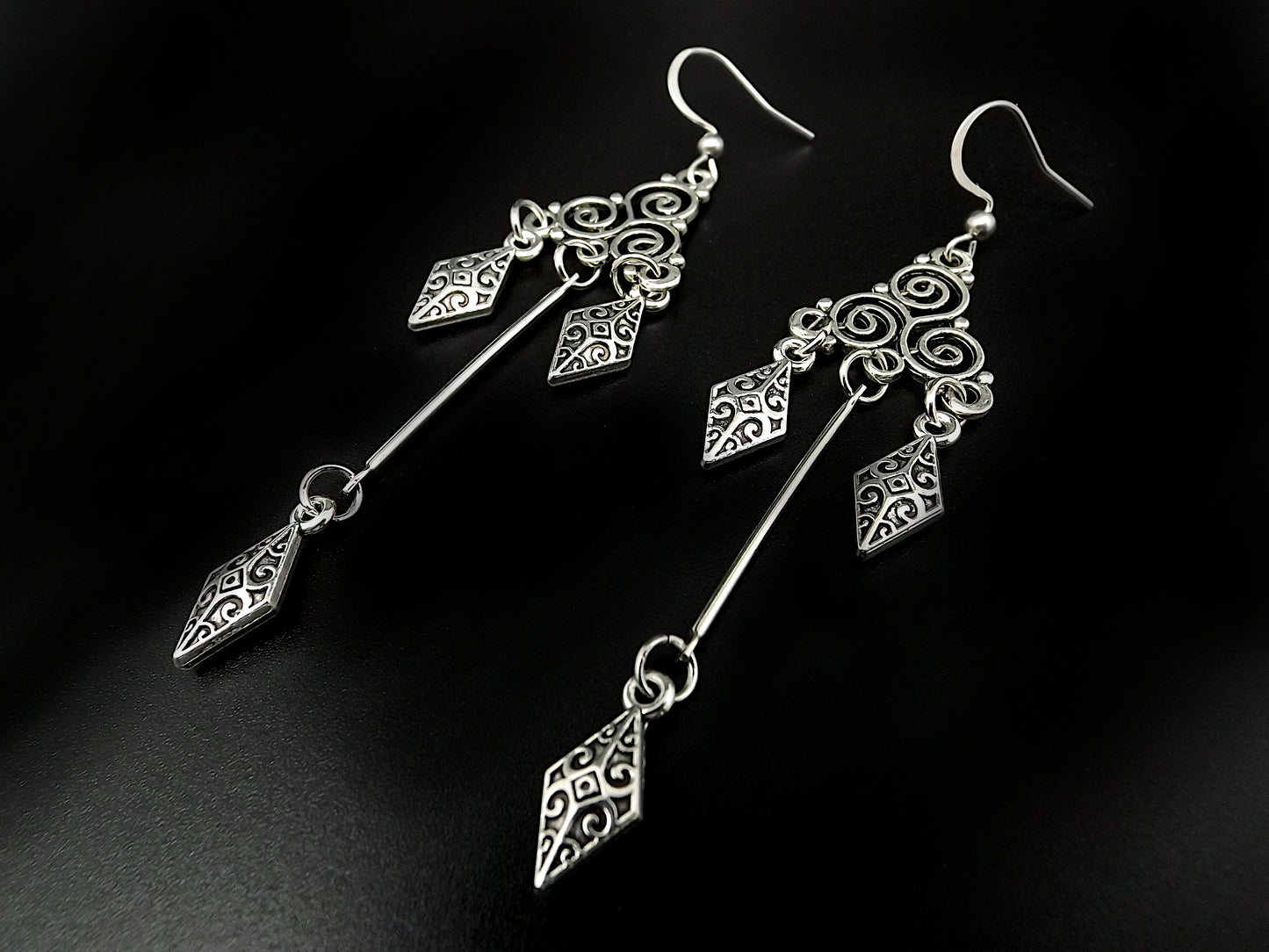 Boucles d'oreilles viking triskèle.